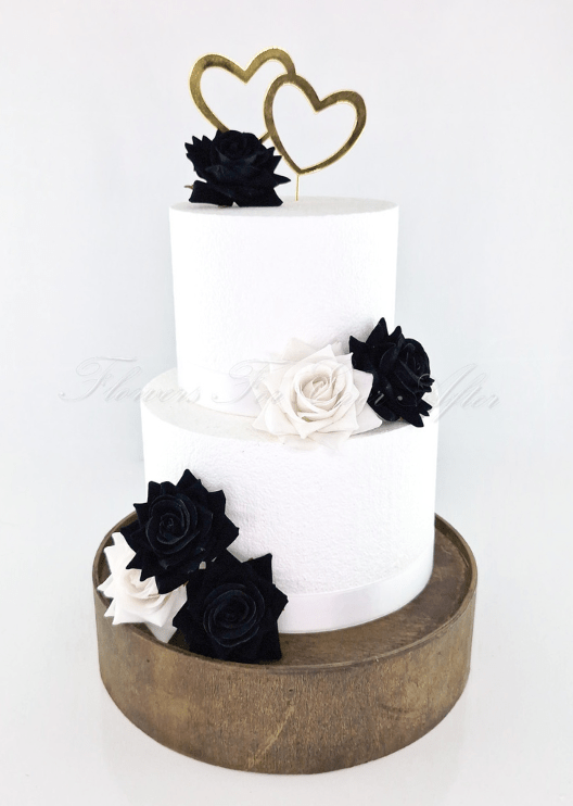 Artificial wedding cake flower pieces showing loose faux rose heads and green sepals. For birthday, event and celebration cakes. Made in Melbourne by Flowers For Ever After, shipping Australia and Worldwide.