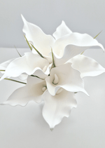 Artificial wedding bouquet close-up showing the curled edges of white faux calla lilies and narrow green leaves. Made in Melbourne by Flowers For Ever After, shipping Australia and Worldwide.