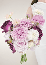Artificial wedding bridesmaid bouquet with lilac, burgundy and white faux flowers and green leaves. Made in Melbourne by Flowers For Ever After, shipping Australia and Worldwide.