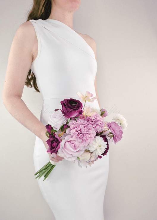 Artificial wedding bridesmaid bouquet, front view of lilac, burgundy and white faux blooms and green foliage. Made in Melbourne by Flowers For Ever After, shipping Australia and Worldwide.