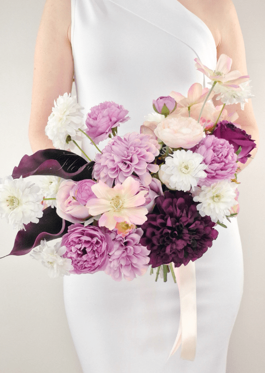 Artificial wedding bridal bouquet, side view of lilac, burgundy and white faux blooms and wrapped stems. Made in Melbourne by Flowers For Ever After, shipping Australia and Worldwide.