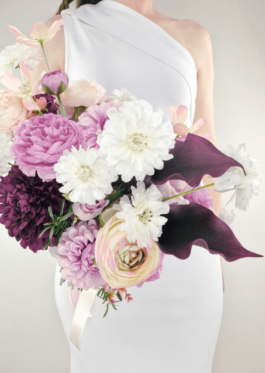 Artificial wedding bridal bouquet, reverse view of lilac, burgundy and white faux flowers and green foliage. Made in Melbourne by Flowers For Ever After, shipping Australia and Worldwide.