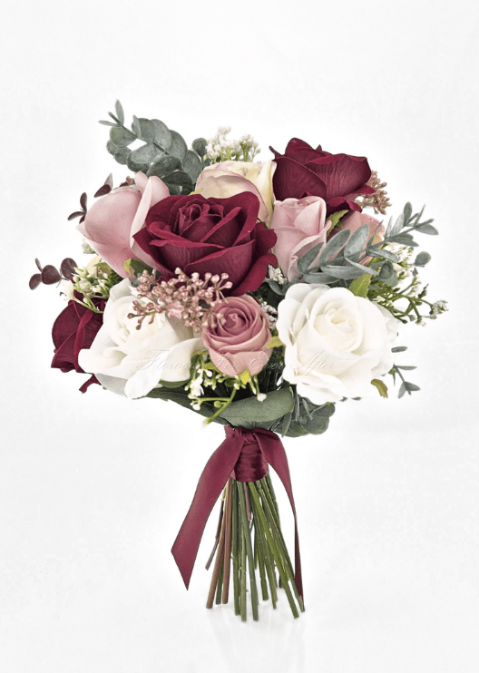 Artificial wedding bridesmaid bouquet with burgundy, blush and white faux roses, bronze flower clusters, eucalyptus and burgundy ribbon bow. Made in Melbourne by Flowers For Ever After, shipping Australia and Worldwide.