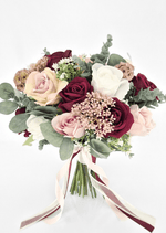 Artificial wedding bridal bouquet with burgundy, blush and white faux roses, tan seedpods, bronze clusters, eucalyptus and trailing ribbons. Made in Melbourne by Flowers For Ever After, shipping Australia and Worldwide.