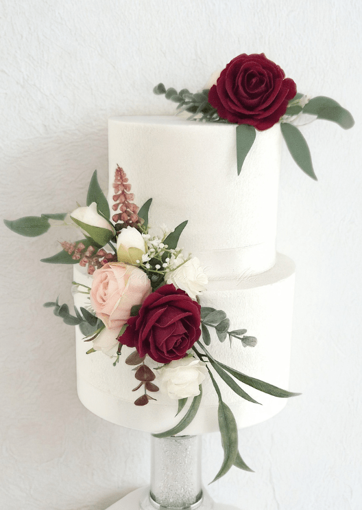 Artificial wedding cake decoration with burgundy, blush and white faux roses, bronze sprigs and eucalyptus in upper and lower clusters. For birthday, event and celebration cakes. Made in Melbourne by Flowers For Ever After, shipping Australia and Worldwide.
