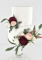 Artificial wedding cake decoration with two clusters of burgundy, blush and white faux roses, bronze sprigs and eucalyptus. For birthday, event and celebration cakes. Made in Melbourne by Flowers For Ever After, shipping Australia and Worldwide.