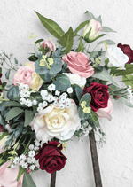 Artificial wedding arbor flower detail with burgundy, blush and cream faux roses, tiny white flowers and eucalyptus. Made in Melbourne by Flowers For Ever After, shipping Australia and Worldwide.