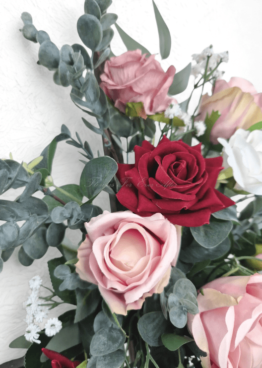 Artificial wedding arbor flower close-up with a burgundy faux rose, blush roses and rounded eucalyptus leaves. Made in Melbourne by Flowers For Ever After, shipping Australia and Worldwide.
