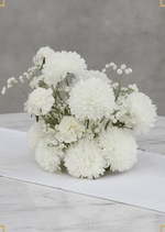 Artificial wedding table centrepiece with rounded white faux chrysanthemum blooms and fine white sprigs. Made in Melbourne by Flowers For Ever After, shipping Australia and Worldwide.