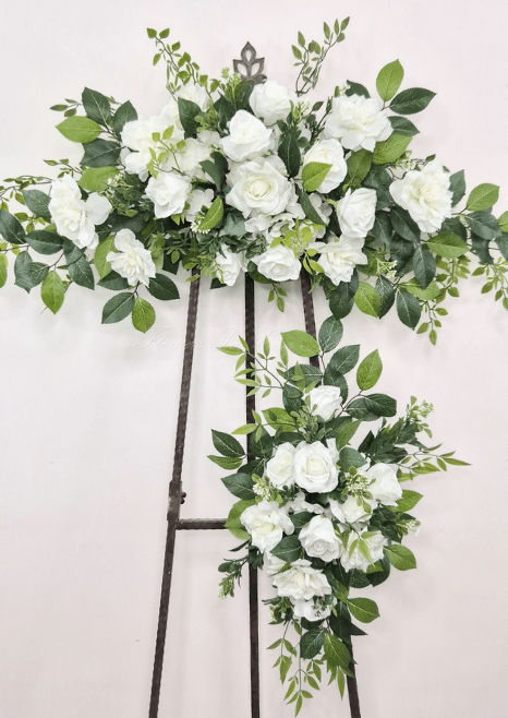 Artificial wedding ceremony floral set with a horizontal white faux rose spray and smaller matching foliage tieback. Made in Melbourne by Flowers For Ever After, shipping Australia and Worldwide.