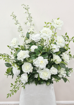 Artificial wedding large pedestal arrangement with white faux roses, layered blooms, tall white flower spikes and green foliage. Made in Melbourne by Flowers For Ever After, shipping Australia and Worldwide.