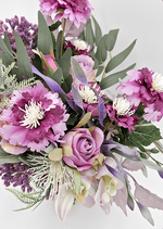 Artificial wedding bridesmaid bouquet, angled view of purple faux flowers, mauve roses, white spiky blooms and eucalyptus. Made in Melbourne by Flowers For Ever After, shipping Australia and Worldwide.