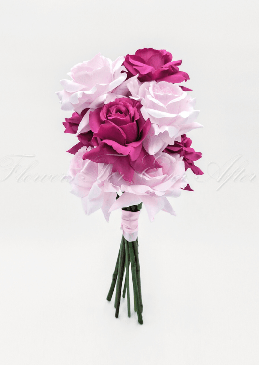 Artificial wedding bridesmaid posy with magenta and pale pink faux roses, green stems and a pale pink ribbon-wrapped handle. Made in Melbourne by Flowers For Ever After, shipping Australia and Worldwide.
