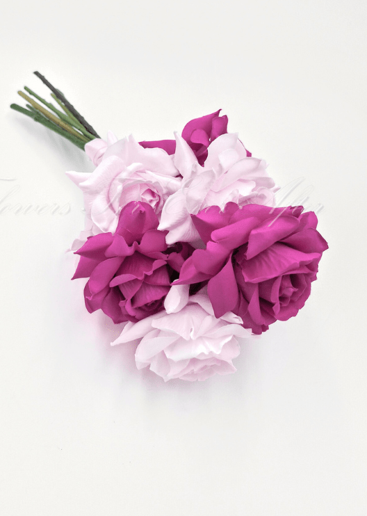 Artificial wedding bridesmaid posy, angled view of magenta and pale pink faux rose petals and exposed green stems. Made in Melbourne by Flowers For Ever After, shipping Australia and Worldwide.