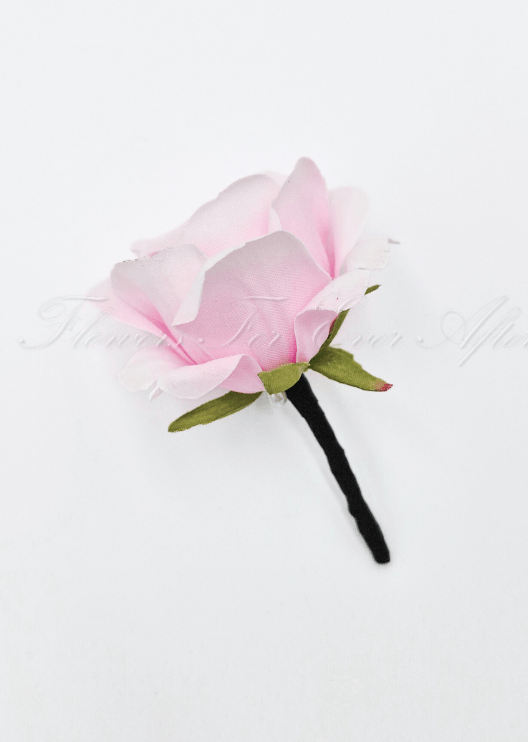 Artificial wedding boutonniere with a pale pink faux rose, green sepals and a black-wrapped stem. For formals, proms and ball occasions. Made in Melbourne by Flowers For Ever After, shipping Australia and Worldwide.