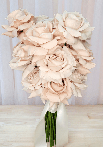 Artificial wedding bridal bouquet with beige-blush faux roses, ivory ribbon bow and gathered green stems. Made in Melbourne by Flowers For Ever After, shipping Australia and Worldwide.