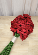 Artificial wedding bouquet, reverse view of red faux roses, gathered green stems and white ribbon wrapping. Made in Melbourne by Flowers For Ever After, shipping Australia and Worldwide.