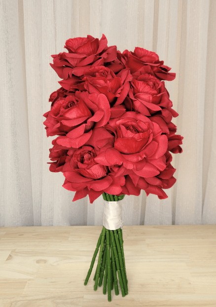 Artificial wedding bouquet, front view of clustered red faux roses and white-wrapped green stems. Made in Melbourne by Flowers For Ever After, shipping Australia and Worldwide.
