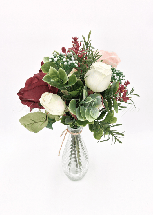 Artificial wedding floral arrangement close-up showing faux flower petals and green foliage. Made in Melbourne by Flowers For Ever After, shipping Australia and Worldwide.