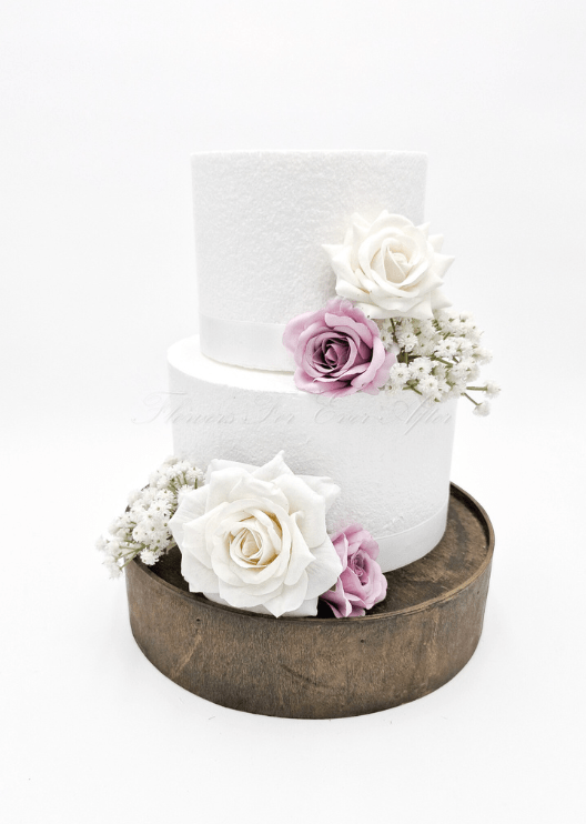 Artificial wedding cake decoration close-up showing faux flower petals and small blooms. For birthday, event and celebration cakes. Made in Melbourne by Flowers For Ever After, shipping Australia and Worldwide.