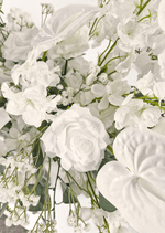 Artificial wedding table garland, angled view of white faux roses, white flowers and trailing greenery. Made in Melbourne by Flowers For Ever After, shipping Australia and Worldwide.