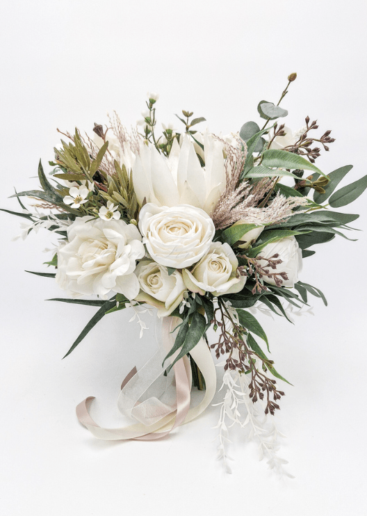 Artificial wedding cake decoration with faux roses, smaller flowers and green foliage arranged over two tiers. For birthday, event and celebration cakes. Made in Melbourne by Flowers For Ever After, shipping Australia and Worldwide.
