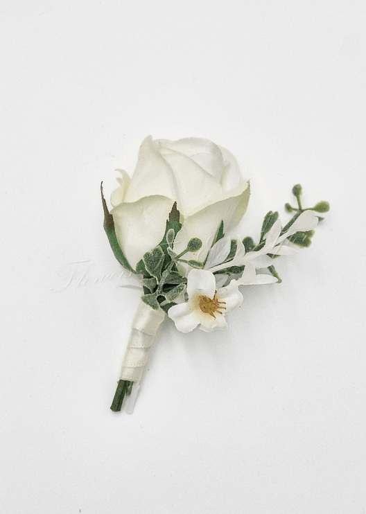 Artificial wedding cake decoration with faux roses, small blooms and green leaves arranged over two tiers. For birthday, event and celebration cakes. Made in Melbourne by Flowers For Ever After, shipping Australia and Worldwide.