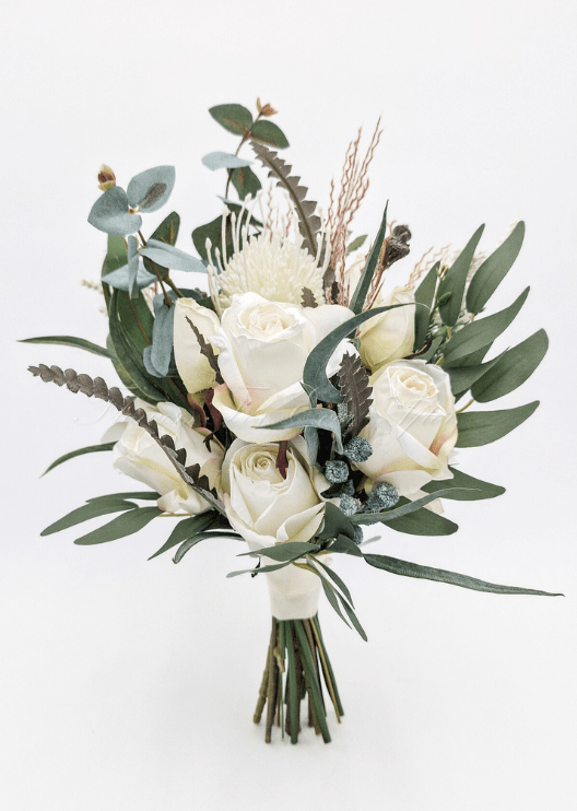 Artificial wedding cake decoration with faux roses and small flowers arranged over two tiers. For birthday, event and celebration cakes. Made in Melbourne by Flowers For Ever After, shipping Australia and Worldwide.