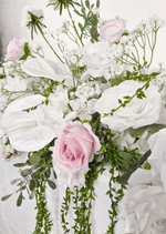 Artificial wedding table garland close-up showing pale pink and white faux roses, white blooms and green leaves. Made in Melbourne by Flowers For Ever After, shipping Australia and Worldwide.