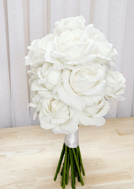 Artificial wedding bouquet, front view of white-ivory faux roses, white ribbon wrapping and green stems. Made in Melbourne by Flowers For Ever After, shipping Australia and Worldwide.