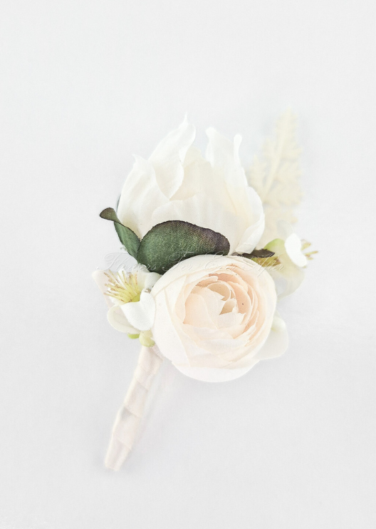Artificial wedding boutonniere with a cream faux peony bud, small ivory bloom, white filler flowers and rounded green leaves. For formals, proms and ball occasions. Made in Melbourne by Flowers For Ever After, shipping Australia and Worldwide.