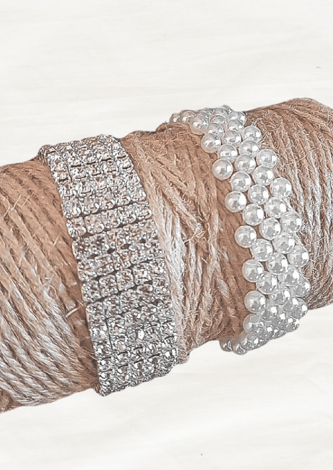 Artificial wedding corsage bracelet-base options for faux flowers, showing a silver rhinestone band and white pearl-style beaded band. For formals, proms and ball occasions. Made in Melbourne by Flowers For Ever After, shipping Australia and Worldwide.