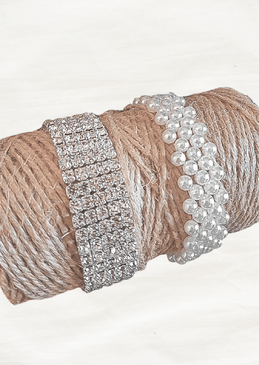 Artificial wedding corsage bracelet options showing a silver-tone rhinestone band and pearl-style band for faux flowers. For formals, proms and ball occasions. Made in Melbourne by Flowers For Ever After, shipping Australia and Worldwide.