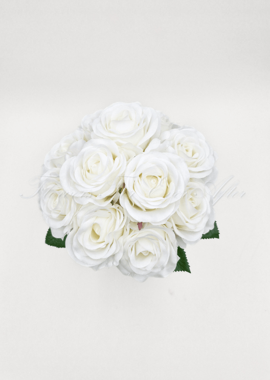 Artificial wedding bridal bouquet close-up showing layered faux flower petals and green foliage. Made in Melbourne by Flowers For Ever After, shipping Australia and Worldwide.