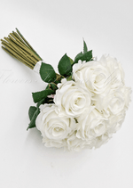Artificial wedding bridesmaid posy, angled view of mixed faux flowers and green leaves. Made in Melbourne by Flowers For Ever After, shipping Australia and Worldwide.
