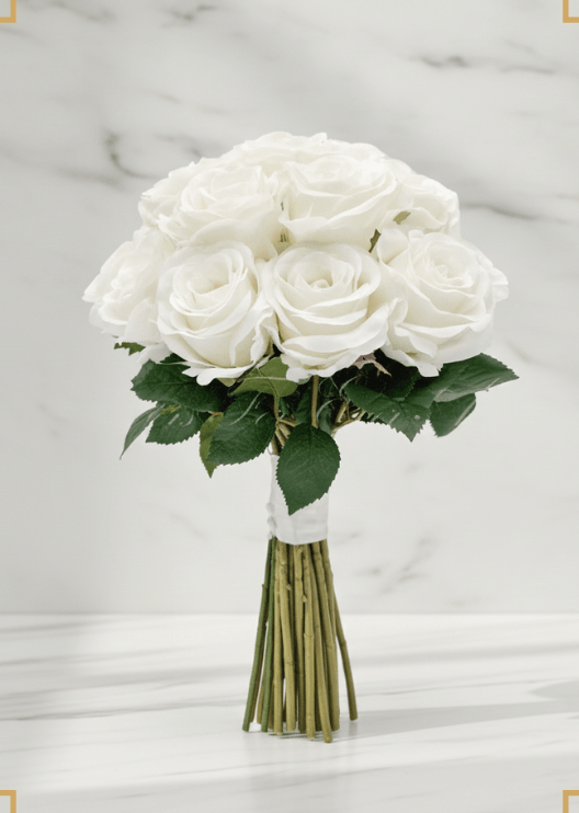 Artificial wedding bridal bouquet with mixed faux flowers, green leaves and a ribbon-wrapped handle. Made in Melbourne by Flowers For Ever After, shipping Australia and Worldwide.