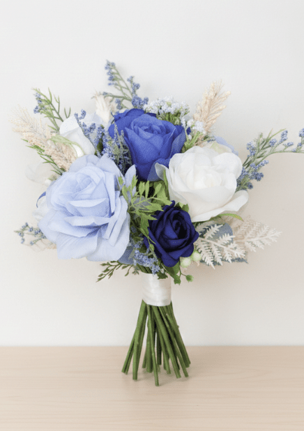 Artificial wedding small bouquet with navy, blue and ivory faux roses, pale sprigs and white-wrapped stems. Made in Melbourne by Flowers For Ever After, shipping Australia and Worldwide.