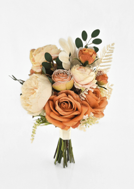 Artificial wedding small bouquet with orange and cream faux roses, peach rosebuds, white orchid and eucalyptus. Made in Melbourne by Flowers For Ever After, shipping Australia and Worldwide.