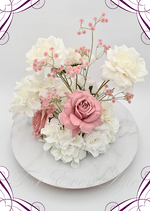 Artificial wedding centrepiece, front view of dusty pink and white faux roses, cream blooms, white hydrangea and pink baby's breath. Made in Melbourne by Flowers For Ever After, shipping Australia and Worldwide.