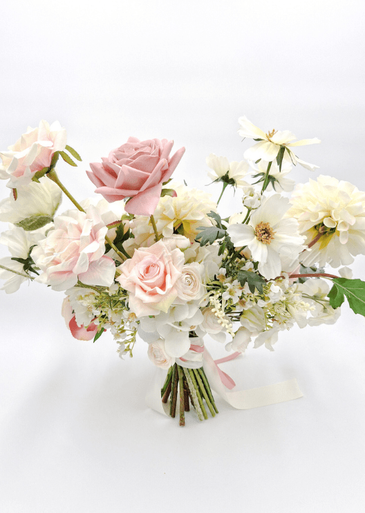 Artificial wedding bridal bouquet, angled view of mixed faux roses and green leaves. Made in Melbourne by Flowers For Ever After, shipping Australia and Worldwide.
