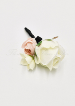 Artificial wedding boutonniere, angled view of a faux rose, small blooms and green leaves. For formals, proms and ball occasions. Made in Melbourne by Flowers For Ever After, shipping Australia and Worldwide.