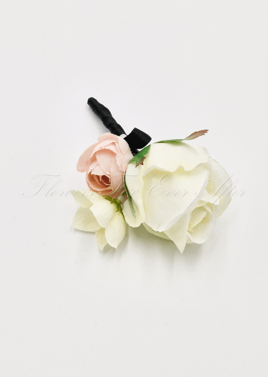 Artificial wedding boutonniere, angled view of a faux rose, small blooms and green leaves. For formals, proms and ball occasions. Made in Melbourne by Flowers For Ever After, shipping Australia and Worldwide.