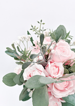 Artificial wedding bridesmaid bouquet close-up with pale pink faux roses, white pompom flowers and eucalyptus. Made in Melbourne by Flowers For Ever After, shipping Australia and Worldwide.