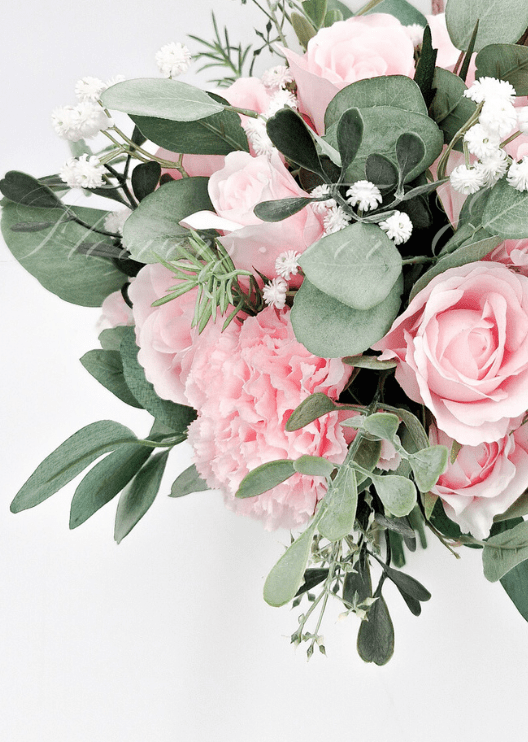 Artificial wedding bridal bouquet close-up with pale pink faux roses, pink hydrangea, small white flowers and eucalyptus. Made in Melbourne by Flowers For Ever After, shipping Australia and Worldwide.