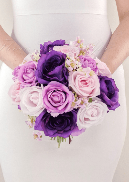 Artificial wedding bridesmaid bouquet with mixed faux blooms, small flowers and green foliage. Made in Melbourne by Flowers For Ever After, shipping Australia and Worldwide.