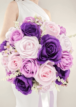 Artificial wedding bridal bouquet close-up showing layered faux flower petals and green foliage. Made in Melbourne by Flowers For Ever After, shipping Australia and Worldwide.