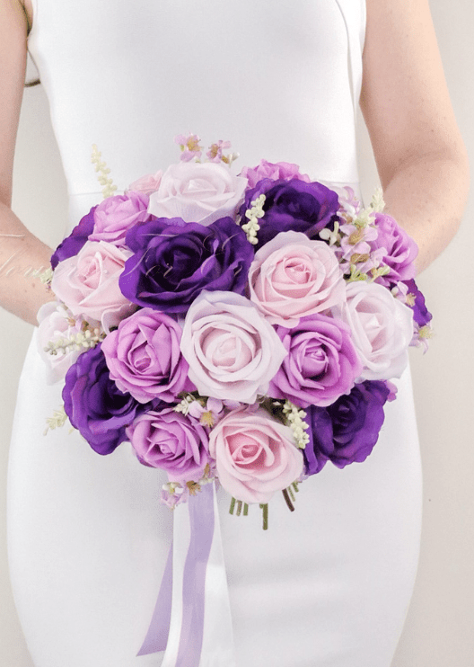 Artificial wedding bridal bouquet, angled view of mixed faux blooms and green leaves. Made in Melbourne by Flowers For Ever After, shipping Australia and Worldwide.