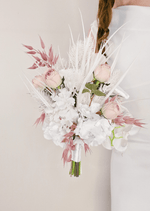 Artificial wedding bridal bouquet close-up showing blush faux roses, red blooms, white orchids and white feathery accents. Made in Melbourne by Flowers For Ever After, shipping Australia and Worldwide.
