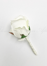 Artificial wedding boutonniere, side view of a white faux rosebud with green sepals and ivory ribbon-wrapped stem. For formals, proms and ball occasions. Made in Melbourne by Flowers For Ever After, shipping Australia and Worldwide.