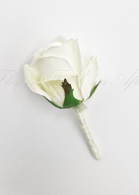 Artificial wedding boutonniere with a white faux rosebud, green sepals and an ivory ribbon-wrapped stem. For formals, proms and ball occasions. Made in Melbourne by Flowers For Ever After, shipping Australia and Worldwide.